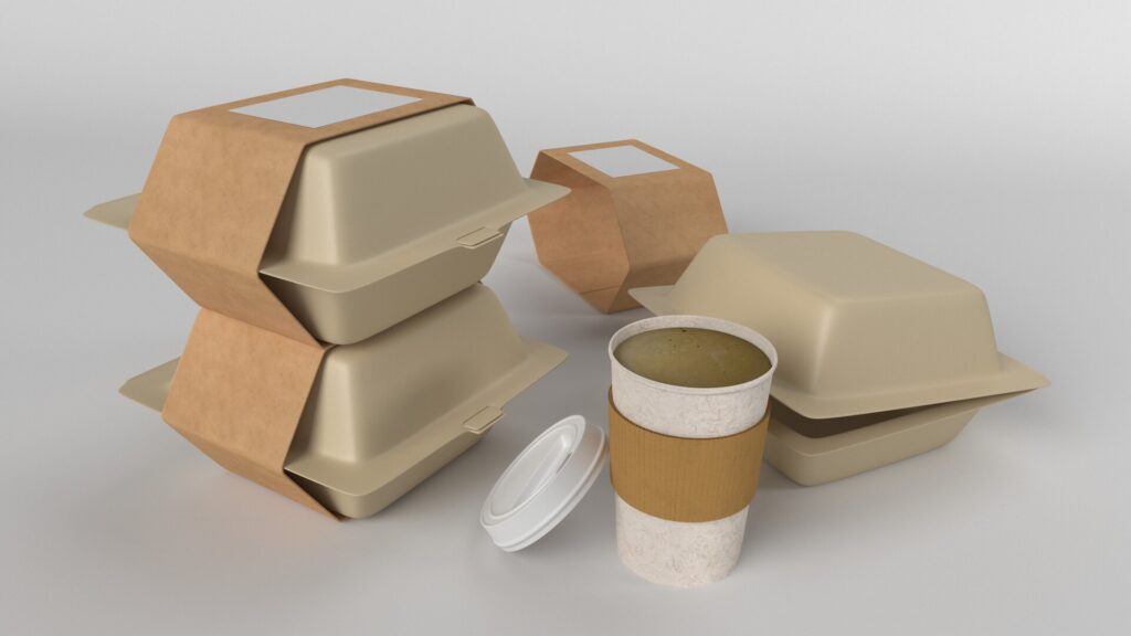 Leere Einweg-Lebensmittelbehälter aus Kunststoff und Bio To Go Verpackungen